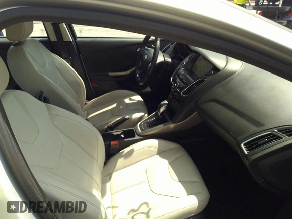 2018 Ford Focus Titanium with VIN 1FADP3J26JL280723, listed as a IAAI auction lot 42319900 with 149,583 mi miles and . Bid and sale history available at DreamBid. Image 5.