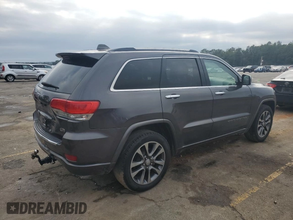 2017 Jeep Grand Cherokee Overland with VIN 1C4RJECG2HC903366, listed as a Copart auction lot 44140155 with 102,459 mi miles and Salvage title. Bid and sale history available at DreamBid. Image 3.