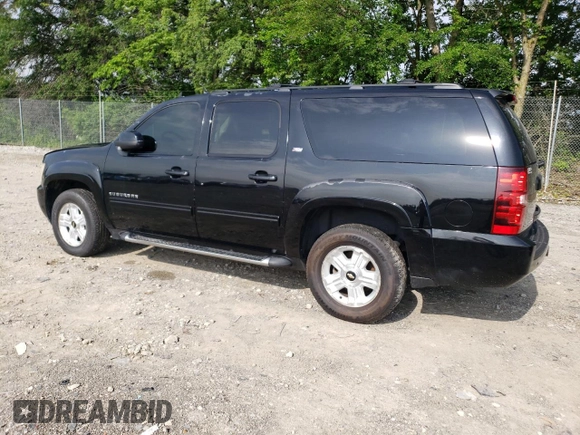 2011 Chevrolet Suburban LT z VIN 1GNSKJE31BR148448, wystawiony jako Copart lot #61057955 z przebiegiem 237 656 mil mil oraz Czysty tytuł • Clean title. Historia ofert i sprzedaży dostępna na DreamBid. Obrazek 2.
