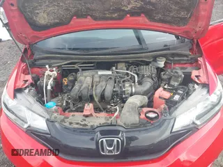 2017 Honda Fit LX with VIN JHMGK5H52HS019489, listed as a IAAI auction lot 42269808 with 148,751 mi miles and . Bid and sale history available at DreamBid. Image 10.