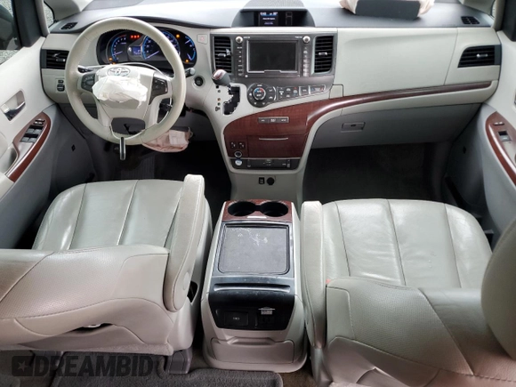 2012 Toyota Sienna XLE AAS with VIN 5TDYK3DC1CS279236, listed as a Copart auction lot 63329165 with 143,937 mi miles and Salvage title. Bid and sale history available at DreamBid. Image 8.