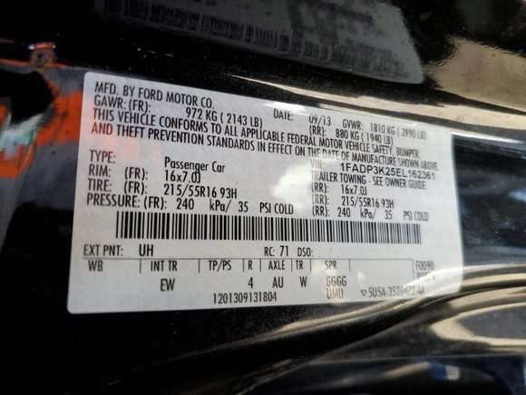 2014 Ford Focus SE with VIN 1FADP3K25EL162361, listed as a Copart auction lot 82168994 with Not Provided miles and Salvage Title. Bid and sale history available at carsss.com. Image 12.