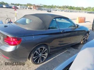 2020 BMW 2 Series 230i xDrive with VIN WBA2K1C08L7G28887, listed as a IAAI auction lot 42122785 with 30,599 mi miles and . Bid and sale history available at carsss.com. Image 13.
