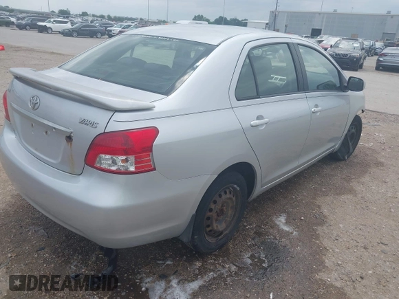 2008 Toyota Yaris with VIN JTDBT923184018720, listed as a IAAI auction lot 42038762 with 246,994 mi miles. Bid and sale history available at carsss.com. Image 4.