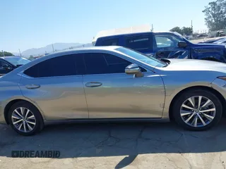 2021 Lexus ES 300h with VIN 58ACA1C1XMU007576, listed as a IAAI auction lot 42302934 with 24,614 mi miles and . Bid and sale history available at DreamBid. Image 13.