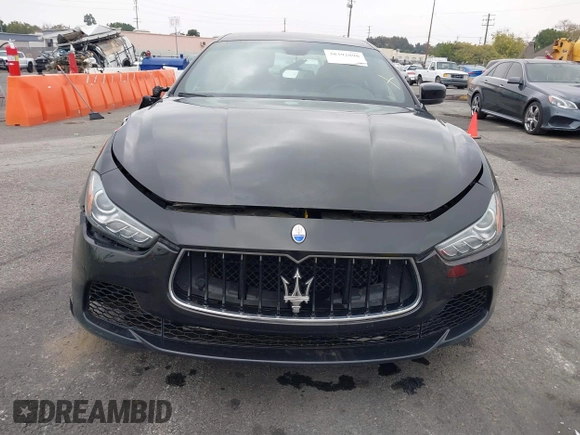 2015 Maserati Ghibli z VIN ZAM57XSA4F1151843, wystawiony jako IAAI lot #38392898 z przebiegiem 88 147 mil mil oraz . Historia ofert i sprzedaży dostępna na DreamBid. Obrazek 12.
