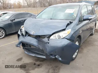 2013 Toyota Sienna XLE with VIN 5TDDK3DC1DS062849, listed as a IAAI auction lot 41510296 with 100,178 mi miles and . Bid and sale history available at DreamBid. Image 6.