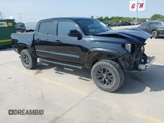 2021 Toyota Tacoma SR with VIN 5TFAX5GN4MX189814, listed as a IAAI auction lot 42293643 with 76,654 mi miles and . Bid and sale history available at DreamBid. Image 1.