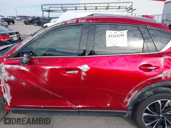 2023 Mazda CX-5 2.5 S Premium Package with VIN JM3KFBDM7P0165741, listed as a IAAI auction lot 41343299 with 35,684 mi miles. Bid and sale history available at carsss.com. Image 15.