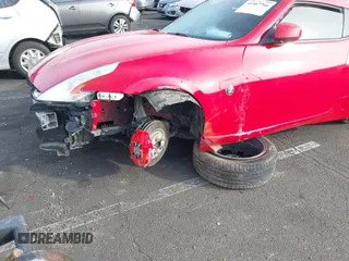 2014 Nissan 370Z Nismo with VIN JN1AZ4EH9EM636306, listed as a IAAI auction lot 41467766 with 101,021 mi miles and . Bid and sale history available at DreamBid. Image 6.