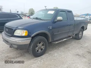 2002 Ford F-150 XL with VIN 1FTRX18W22NA26073, listed as a IAAI auction lot 42126819 with 212,893 mi miles and . Bid and sale history available at DreamBid. Image 2.