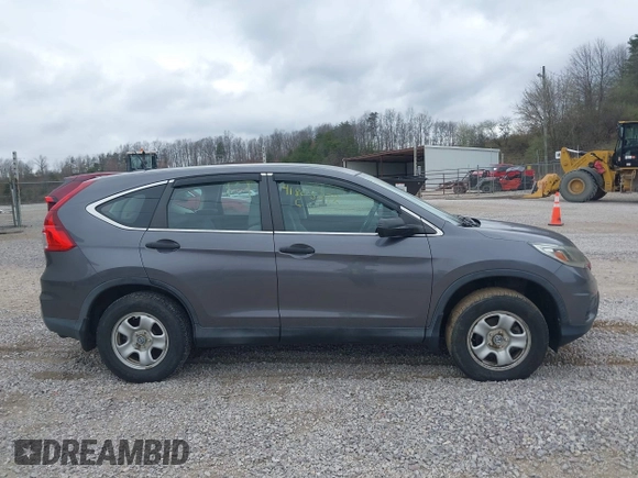 2015 Honda CR-V LX with VIN 2HKRM4H33FH617583, listed as a IAAI auction lot 41805272 with 88,214 mi miles and . Bid and sale history available at DreamBid. Image 14.