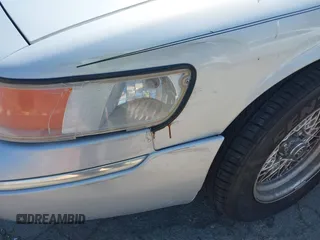 2002 Mercury Grand Marquis LS Premium z VIN 2MEFM75W82X653148, wystawiony jako IAAI lot #42307985 z przebiegiem 92 233 mil mil oraz . Historia ofert i sprzedaży dostępna na DreamBid. Obrazek 13.