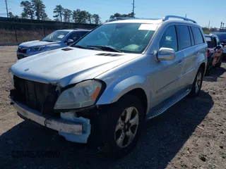 2010 Mercedes-Benz GL 450 with VIN 4JGBF7BE6AA589281, listed as a IAAI auction lot 42055449 with 192,070 mi miles and . Bid and sale history available at DreamBid. Image 2.
