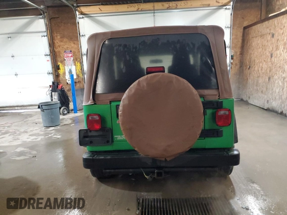 2005 Jeep Wrangler X с VIN 1J4FA39S35P305742, выставлен на аукционе Copart как лот 57124995 с пробегом 159 419 миль миль и Списание • Salvage title. История ставок и продаж доступна на DreamBid. Изображение 6.