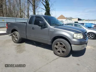 2005 Ford F-150 XL with VIN 1FTRF12215NB69528, listed as a Copart auction lot 51614365 with 160,349 mi miles and Salvage title. Bid and sale history available at DreamBid. Image 4.