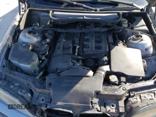 2005 BMW 3 Series 325i with VIN WBAET37405NJ86914, listed as a Copart auction lot 87677045 with 163,011 mi miles and Salvage Title. Bid and sale history available at carsss.com. Image 12.