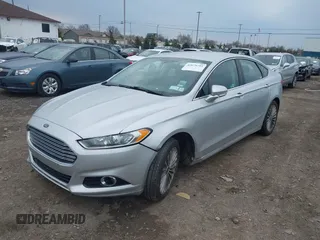 2016 Ford Fusion Titanium with VIN 3FA6P0K93GR117587, listed as a IAAI auction lot 42079701 with 142,105 mi miles. Bid and sale history available at carsss.com. Image 17.