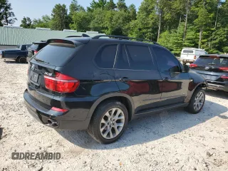 2012 BMW X5 35i with VIN 5UXZV4C57CL756062, listed as a Copart auction lot 65752145 with 160,860 mi miles and Clean title. Bid and sale history available at DreamBid. Image 3.
