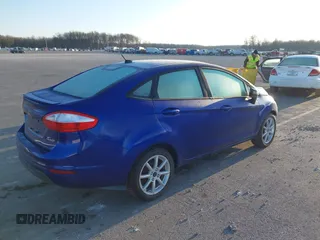 2014 Ford Fiesta SE z VIN 3FADP4BJ5EM243551, wystawiony jako IAAI lot #41919239 z przebiegiem 92 396 mil mil oraz . Historia ofert i sprzedaży dostępna na DreamBid. Obrazek 4.