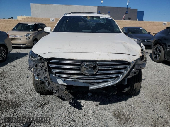 2019 Mazda CX-9 Grand Touring with VIN JM3TCBDY4K0303079, listed as a Copart auction lot 52557565 with 72,946 mi miles and Salvage Title. Bid and sale history available at DreamBid. Image 5.