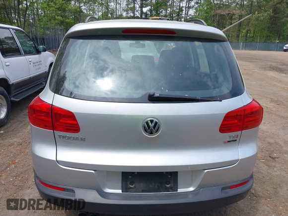 2016 Volkswagen Tiguan S with VIN WVGBV7AX1GW523335, listed as a IAAI auction lot 42091690 with 165,495 mi miles and . Bid and sale history available at DreamBid. Image 16.