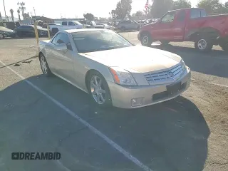 2006 Cadillac XLR z VIN 1G6YV36AX65603770, wystawiony jako Copart lot #81527954 z przebiegiem 59 498 mil mil oraz Szkody całkowita. Historia ofert i sprzedaży dostępna na DreamBid. Obrazek 11.