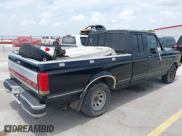 1990 Ford F-150 with VIN 1FTEX15N0LKA06904, listed as a IAAI auction lot 42603529 with 473,180 mi miles and . Bid and sale history available at DreamBid. Image 4.