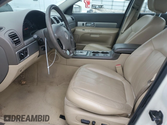 2005 Lincoln LS Sport z VIN 1LNHM87A05Y667868, wystawiony jako Copart lot #73318074 z przebiegiem 114 623 mil mil oraz Szkoda całkowita • Salvage title. Historia ofert i sprzedaży dostępna na DreamBid. Obrazek 7.