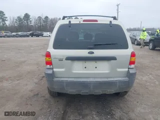 2005 Ford Escape XLT with VIN 1FMYU93135DA07844, listed as a IAAI auction lot 41786019 with 118,840 mi miles. Bid and sale history available at carsss.com. Image 16.