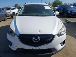 2013 Mazda CX-5 Sport with VIN JM3KE2BE4D0153251, listed as a IAAI auction lot 42297235 with 177,019 mi miles and . Bid and sale history available at DreamBid. Image 12.