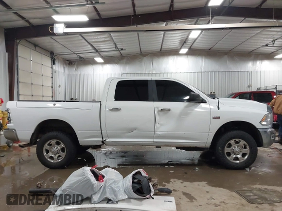 2018 Ram 2500 SLT с VIN 3C6TR5DTXJG284102, выставлен на аукционе IAAI как лот 41609869 с пробегом 148 869 миль миль и . История ставок и продаж доступна на DreamBid. Изображение 14.