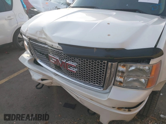 2011 GMC Sierra 1500 Denali z VIN 3GTP2XE20BG152905, wystawiony jako IAAI lot #41079419 z przebiegiem 158 192 mil mil oraz . Historia ofert i sprzedaży dostępna na DreamBid. Obrazek 6.