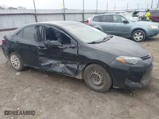 2019 Toyota Corolla L with VIN 5YFBURHE4KP905206, listed as a IAAI auction lot 40828883 with 122,982 mi miles. Bid and sale history available at carsss.com. Image 13.