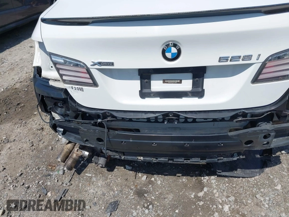 2013 BMW 5 Series 528i xDrive with VIN WBAXH5C52DD113388, listed as a IAAI auction lot 41997250 with 145,990 mi miles and . Bid and sale history available at carsss.com. Image 19.