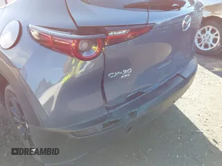 2023 Mazda CX-30 S Carbon Edition with VIN 3MVDMBCM3PM579345, listed as a IAAI auction lot 41689892 with 18,621 mi miles and . Bid and sale history available at DreamBid. Image 6.