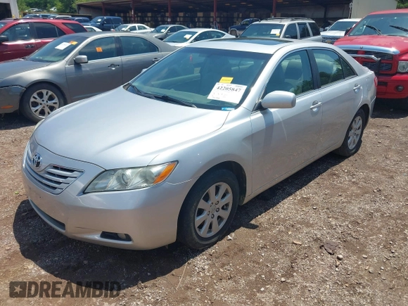 2009 Toyota Camry LE z VIN 4T1BK46K49U592233, wystawiony jako IAAI lot #42205847 z przebiegiem 141 226 mil mil oraz . Historia ofert i sprzedaży dostępna na DreamBid. Obrazek 2.