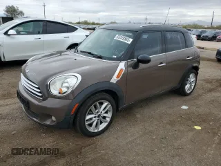 2013 MINI Countryman with VIN WMWZB3C53DWM31457, listed as a Copart auction lot 55528885 with 137,279 mi miles and Salvage title. Bid and sale history available at DreamBid. Image 1.