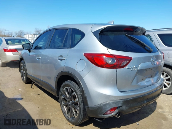 2016 Mazda CX-5 Grand Touring with VIN JM3KE4DY9G0795360, listed as a IAAI auction lot 41933991 with 176,373 mi miles. Bid and sale history available at carsss.com. Image 3.