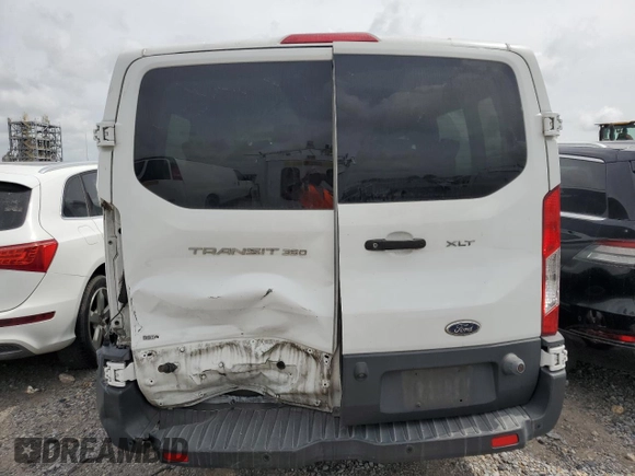 2018 Ford Transit Passenger XL with VIN 1FBZX2YM5JKB09425, listed as a Copart auction lot 54478675 with 147,801 mi miles and Salvage Title. Bid and sale history available at carsss.com. Image 6.
