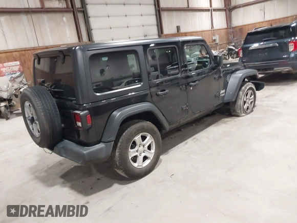 2019 Jeep Wrangler Unlimited Sport Altitude with VIN 1C4HJXDGXKW505396, listed as a IAAI auction lot 42039985 with 146,178 mi miles and . Bid and sale history available at DreamBid. Image 4.