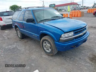 2000 Chevrolet Blazer LS z VIN 1GNCT18W6YK288858, wystawiony jako IAAI lot #42344368 z przebiegiem 207 183 mil mil oraz . Historia ofert i sprzedaży dostępna na DreamBid. Obrazek 1.