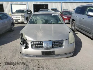 2004 Nissan Maxima SE with VIN 1N4BA41E94C912952, listed as a Copart auction lot 75243344 with 67,963 mi miles and Salvage Title. Bid and sale history available at carsss.com. Image 5.