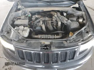 2014 Jeep Grand Cherokee с VIN 1C4RJEJM8EC424373, выставлен на аукционе Copart как лот 72256674 с пробегом 128 998 миль миль и Списание • Salvage title. История ставок и продаж доступна на DreamBid. Изображение 11.