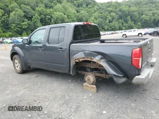 2010 Nissan Frontier SE with VIN 1N6AD0EV4AC402517, listed as a Copart auction lot 62109945 with 407,361 mi miles and Salvage title. Bid and sale history available at DreamBid. Image 2.