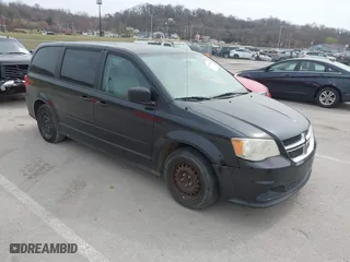 2012 Dodge Grand Caravan SE with VIN 2C4RDGBG1CR140891, listed as a IAAI auction lot 41768926 with 224,409 mi miles. Bid and sale history available at carsss.com. Image 1.