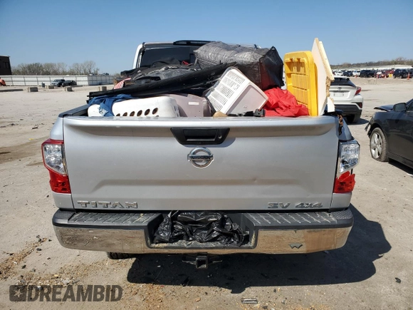 2018 Nissan Titan SV z VIN 1N6AA1EJ6JN542729, wystawiony jako Copart lot #52312035 z przebiegiem Nie podano mil oraz Szkoda całkowita • Salvage title. Historia ofert i sprzedaży dostępna na DreamBid. Obrazek 6.