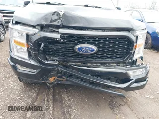 2021 Ford F-150 XL with VIN 1FTEW1EP9MKE37070, listed as a IAAI auction lot 41843951 with 69,679 mi miles and . Bid and sale history available at DreamBid. Image 6.
