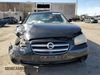 2002 Nissan Maxima GXE z VIN JN1DA31D92T409717, wystawiony jako Copart lot #49413035 z przebiegiem 90 697 mil mil oraz Szkoda całkowita • Salvage title. Historia ofert i sprzedaży dostępna na DreamBid. Obrazek 5.