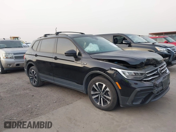 2023 Volkswagen Tiguan S z VIN 3VVRB7AX7PM036833, wystawiony jako IAAI lot #41827631 z przebiegiem 43 383 mil mil oraz . Historia ofert i sprzedaży dostępna na DreamBid. Obrazek 13.